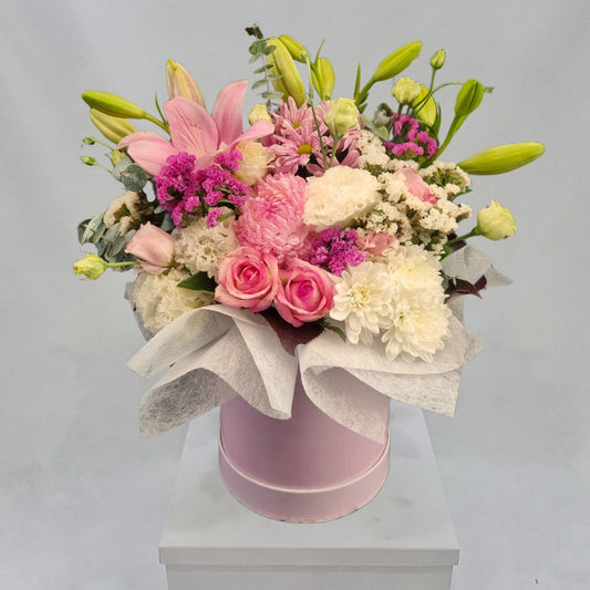 Blushing Blooms Hat Box Arrangement